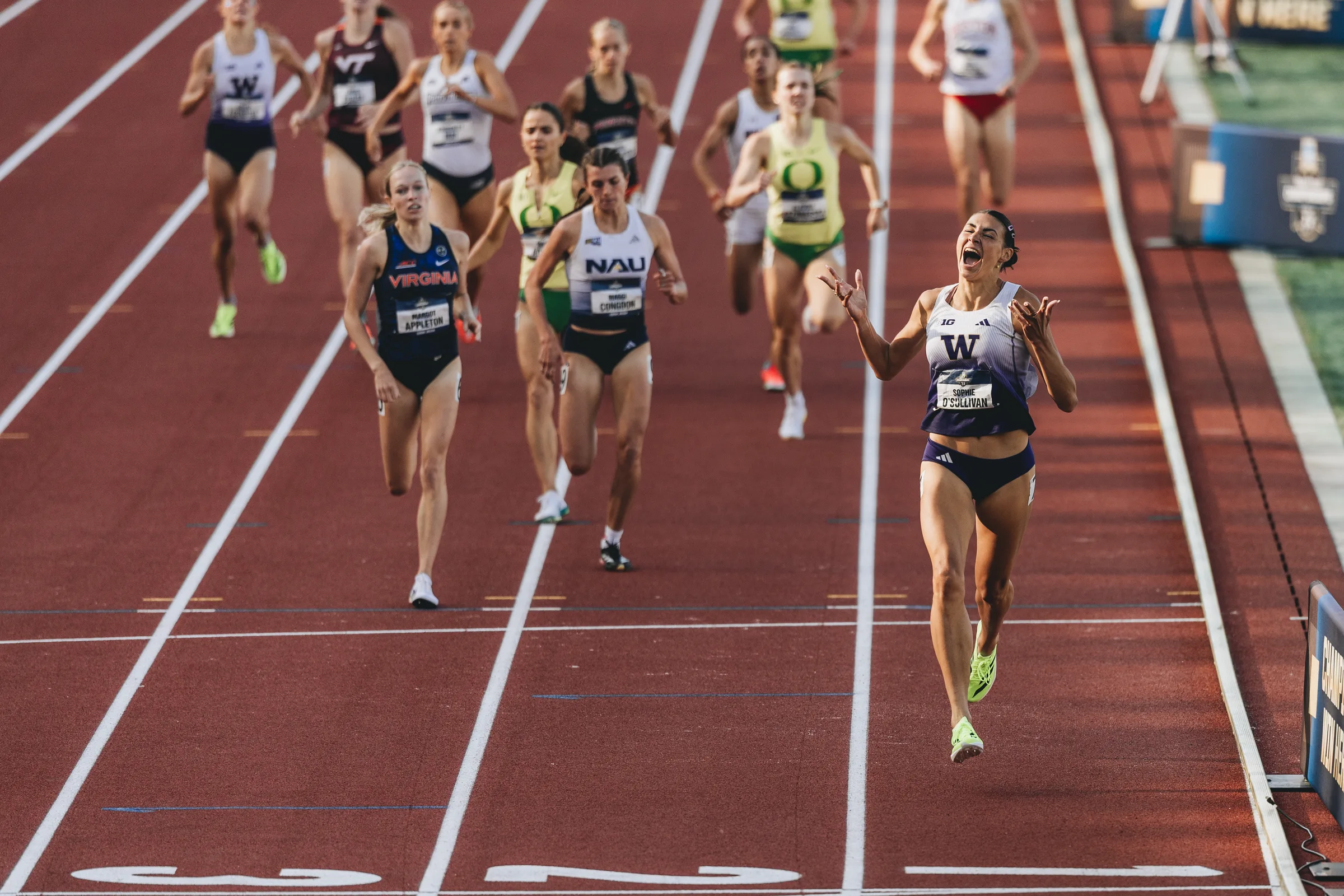 University of Washington junior Sophie O'Sullivan celebrates as she crosses the finish line well ahead of the field to win the NCAA Division I women's 1,500-meter final at Hayward Field in Eugene, Ore. O'Sullivan, the daughter of Irish Olympic silver medalist Sonia O'Sullivan, clocked 4:07.94 with a devastating 58.43-second final lap to claim the national title on June 14, 2025.