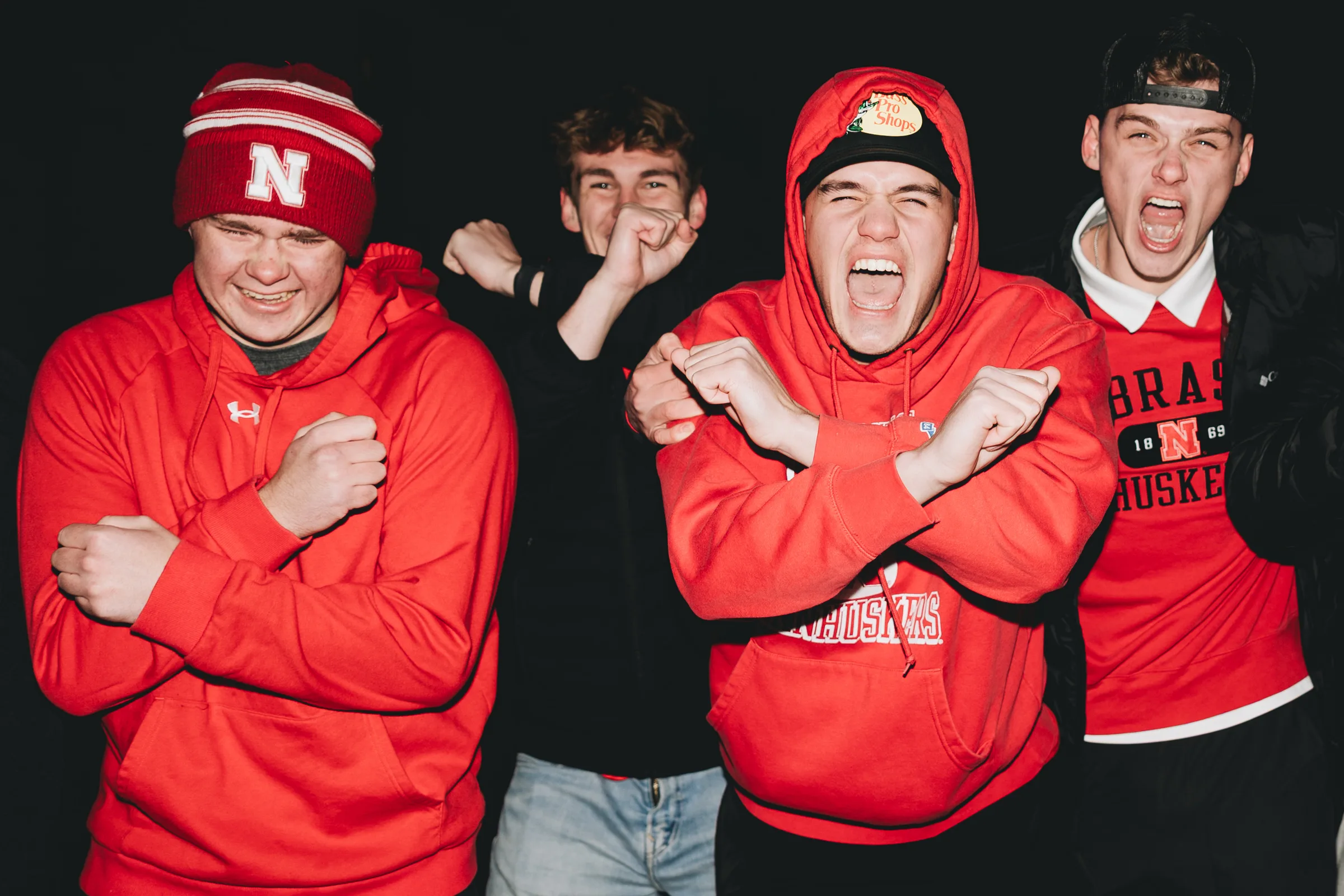 University of Nebraska fans pump their fists and shout outside Pinnacle Bank Arena before the Nebraska Cornhuskers men's basketball game against the Creighton Bluejays in Lincoln, Nebraska, on Wednesday, Jan. 21, 2026. The Creighton-Nebraska rivalry is an intrastate college basketball matchup between programs located just fifty miles apart. Nebraska men's basketball had defeated Creighton 71-50 earlier in the season in front of a sold-out crowd inside Pinnacle Bank Arena on Dec. 7, 2025.