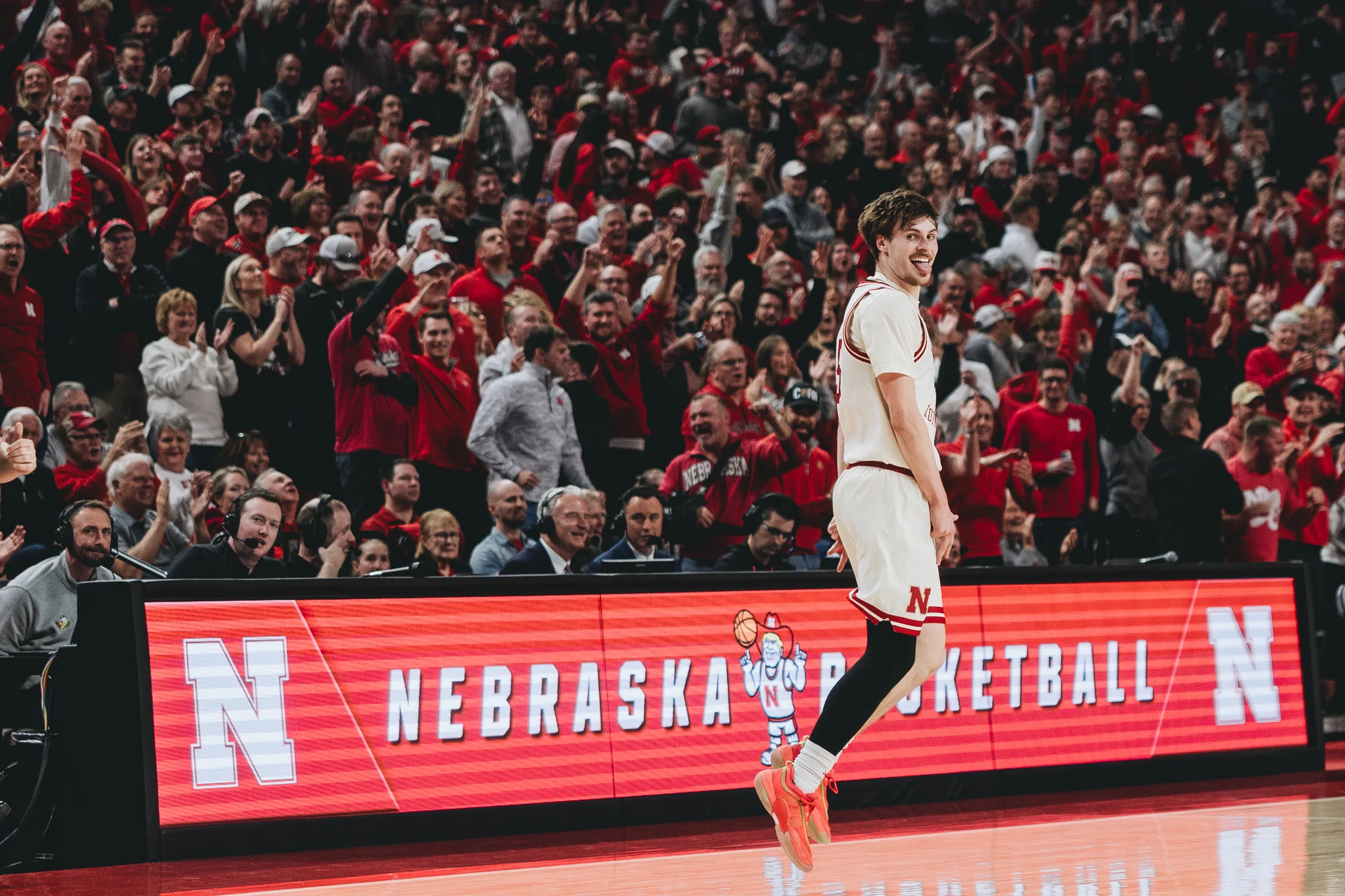 Nebraska Cornhuskers forward Braden Frager celebrates after making a three-point shot to tie a game against Wisconsin.